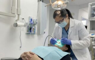 Dentist in Alexandria VA welcoming patient for root canal treatment