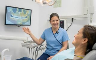 Friendly dentist in Alexandria VA discussing dental filling options in a warm and modern dental office