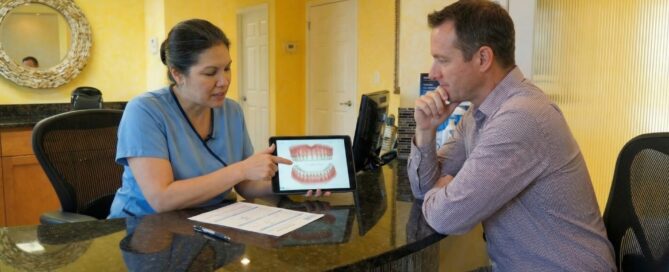 Dentist greeting patient at Dental Clinic in Woodbridge VA, smiling and welcoming