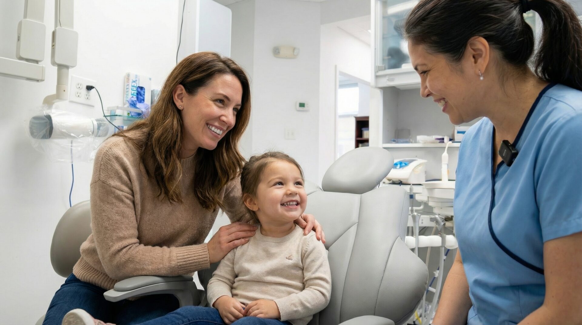 cost-of-kids-braces-woodbridge-va-hero Parent and child smiling at dental office discussing cost of kids braces in Woodbridge VA